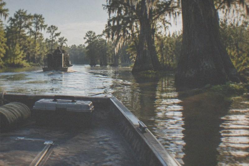 Swamp boat on a Louisiana bayou, the opening half of a day that continues to Whitney Plantation